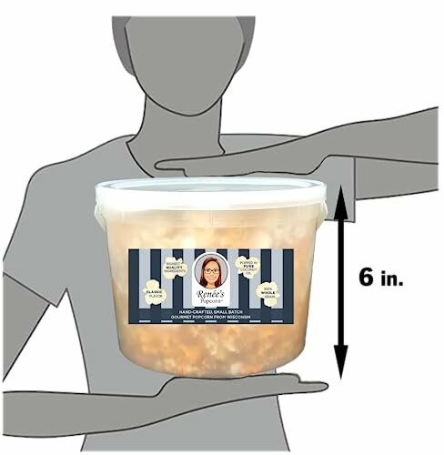 Bucket of gourmet caramel popcorn with labeled container